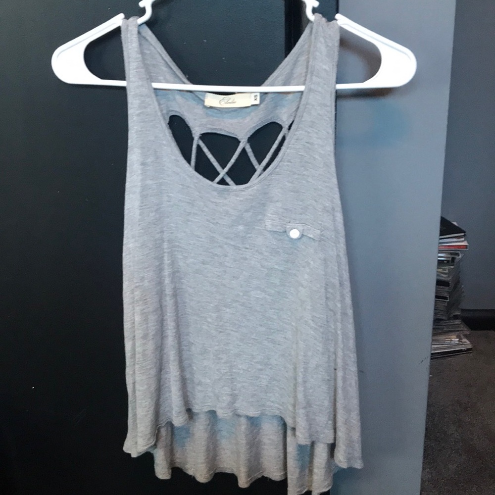 CUTOUT BACK TANK TOP WITH FRONT BUTTON POCKET